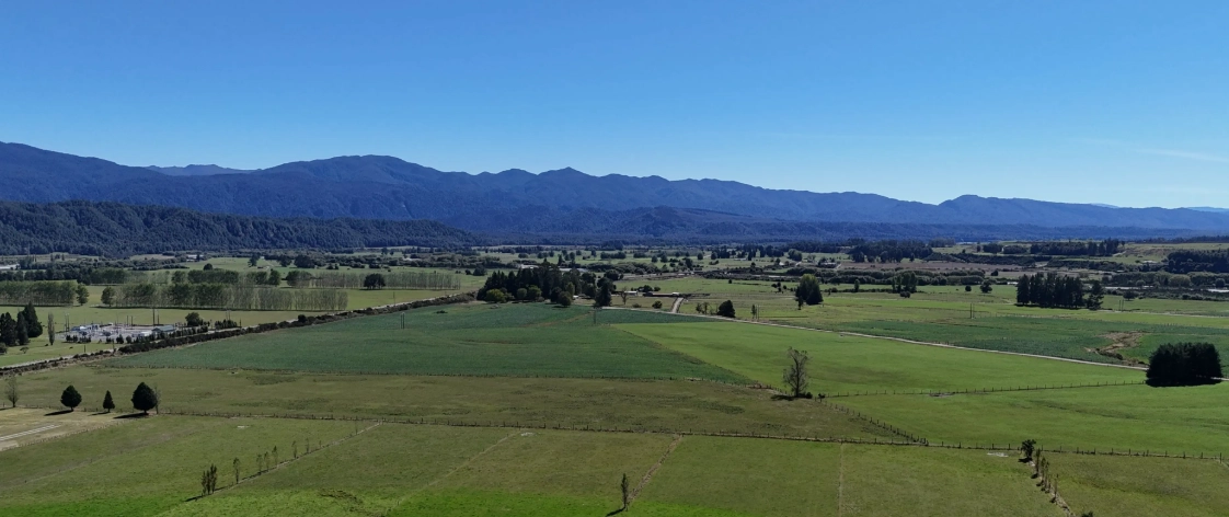 West Coast farmland and mountains near the solar farm project