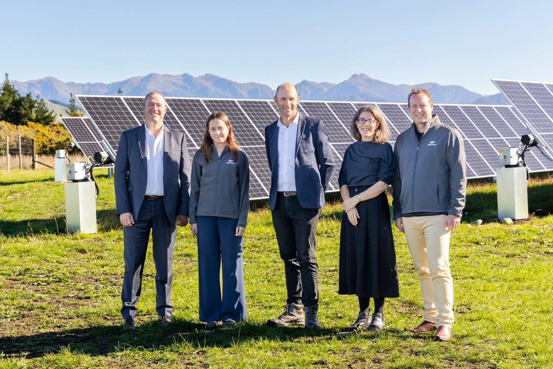 Lightyears team members at a solar project site